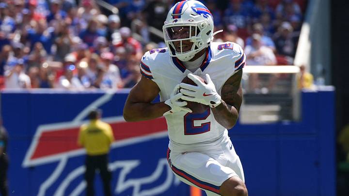 Buffalo Bills wide receiver DJ Moore runs with the ball after making a catch against the Carolina Panthers. Buffalo Bills wide receiver DJ Moore runs with the ball after making a catch against the Carolina Panthers.
