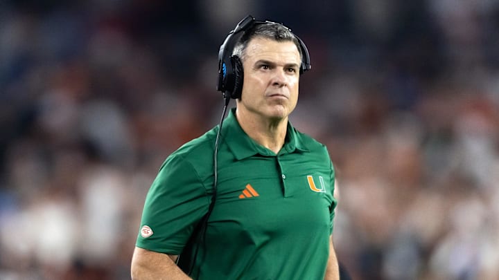 Jan 8, 2026; Glendale, AZ, USA; Miami Hurricanes head coach Mario Cristobal against the Mississippi Rebels during the 2026 Fiesta Bowl and semifinal game of the College Football Playoff at State Farm Stadium. Mandatory Credit: Mark J. Rebilas-Imagn Images