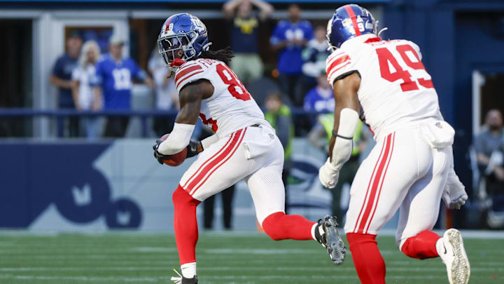 Oct 6, 2024; Seattle, Washington, USA; New York Giants wide receiver Bryce Ford-Wheaton (88) returns a blocked field goal for a touchdown against the Seattle Seahawks during the fourth quarter at Lumen Field. Mandatory Credit: Joe Nicholson-Imagn Images