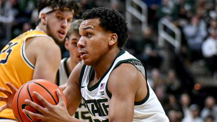 Michigan State's Divine Ugochukwu cuts to the basket on his way to a score against Toledo during the second half on Tuesday, Dec. 16, 2025, at the Breslin Center in East Lansing.