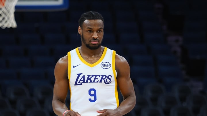Jul 10, 2024; San Francisco, CA, USA; Los Angeles Lakers guard Bronny James Jr. (9) between plays against the Miami Heat during the fourth quarter at Chase Center. Mandatory Credit: Kelley L Cox-USA TODAY Sports