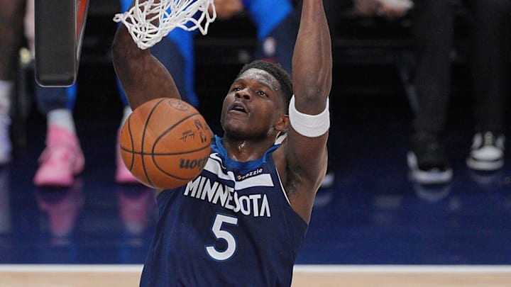 May 24, 2025; Minneapolis, Minnesota, USA; Minnesota Timberwolves guard Anthony Edwards (5) dunks the ball against the Oklahoma City Thunder during the first half in game three of the western conference finals for the 2025 NBA Playoffs at Target Center. Mandatory Credit: Brad Rempel-Imagn Images