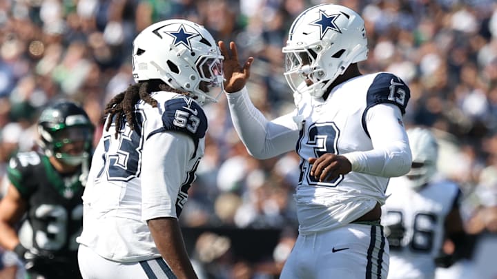 Dallas Cowboys defensive end James Houston (53) and defensive end Dante Fowler Jr. (13) react after a sack against the New York Jets during the first half at MetLife Stadium. Manda