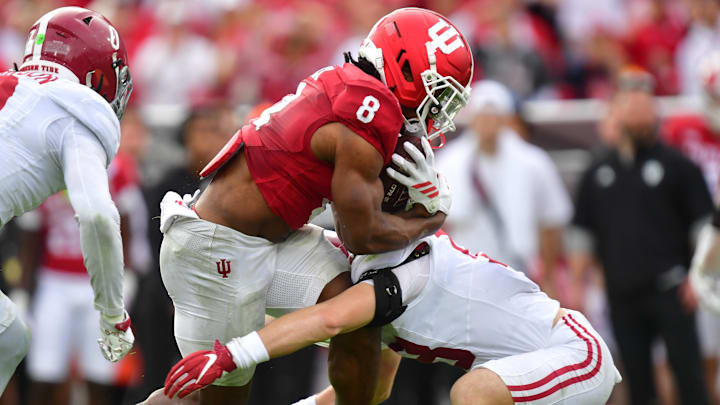 Jan 1, 2026; Pasadena, CA, USA; Indiana Hoosiers running back Kaelon Black (8) runs against Alabama Crimson Tide defensive back Bray Hubbard (18) in the first half of the 2026 Rose Bowl and quarterfinal game of the College Football Playoff at Rose Bowl Stadium.