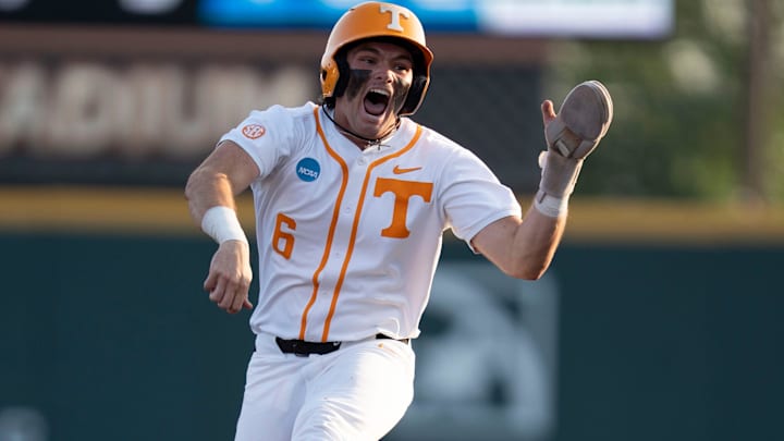 Tennessee's Gavin Kilen (6) leaps in celebration as he rounds the bases after Andrew Fischer (11) hits a home run at the NCAA college baseball Knoxville Regional final against Wake Forest on June 2, 2025, in Knoxville, Tenn.