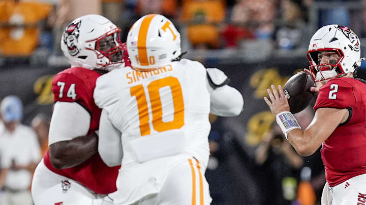 Packers draft pick Anthony Belton pass protects for North Carolina State Wolfpack quarterback Grayson McCall. Packers draft pick Anthony Belton pass protects for North Carolina State Wolfpack quarterback Grayson McCall.