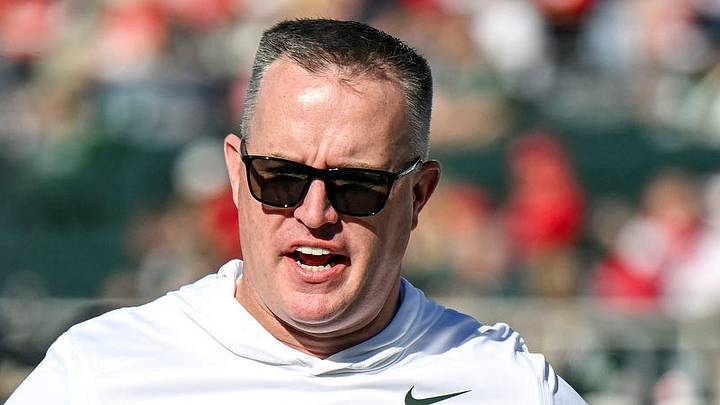 Michigan State’s head coach Pat Fitzgerald, center, talks with Jaziun Patterson, left, and Marvis Parrish before the football game against Nebraska on Saturday, Sept. 26, 2026, in East Lansing. Michigan State’s head coach Pat Fitzgerald, center, talks with Jaziun Patterson, left, and Marvis Parrish before the football game against Nebraska on Saturday, Sept. 26, 2026, in East Lansing.