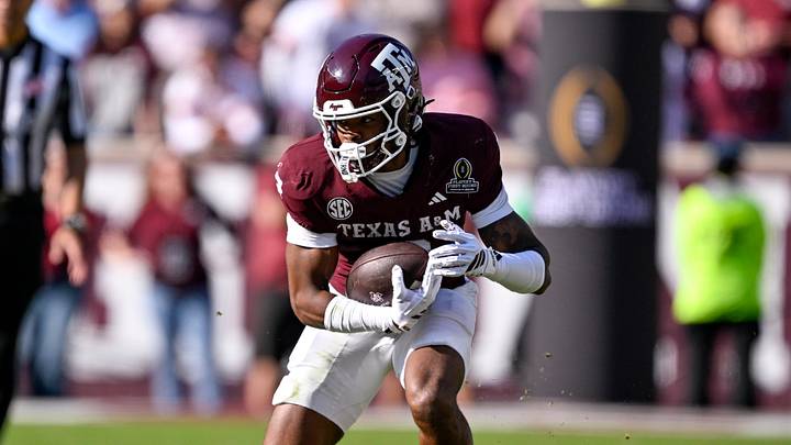 Texas A&M Aggies wide receiver Terry Bussey (2) runs with the ball during the game between the Aggies and the Hurricanes at Kyle Field. Texas A&M Aggies wide receiver Terry Bussey (2) runs with the ball during the game between the Aggies and the Hurricanes at Kyle Field.