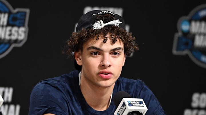 Illinois Fighting Illini guard Keaton Wagler (23) speaks in a press conference after defeating the Iowa Hawkeyes in an Elite Eight game of the South Regional of the men's 2026 NCAA Tournament at Toyota Center on March 28, 2026.
