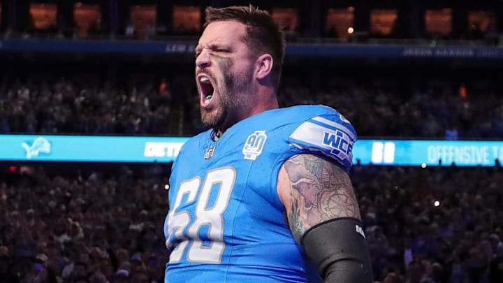 Detroit Lions left tackle Taylor Decker takes the field during player introductions before the Detroit Lions game against the Carolina Panthers at Ford Field in Detroit on Sunday, Oct. 8, 2023.