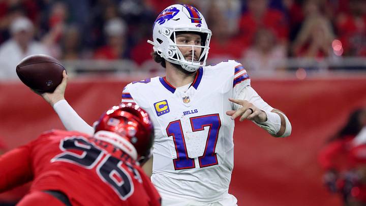 Buffalo Bills quarterback Josh Allen (17) throws a pass against Houston Texans defensive end Denico Autry (96) in the second quarter at NRG Stadium.
