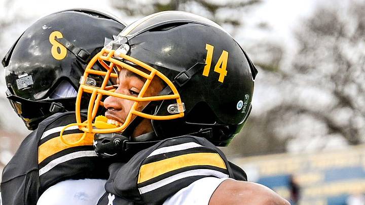 Detroit King's Don Spillers, right, celebrate his touchdown catch with Tay'Shawn Henry during the fourth quarter in the game against Mason on Saturday, Nov. 23, 2024, at Chelsea High School.