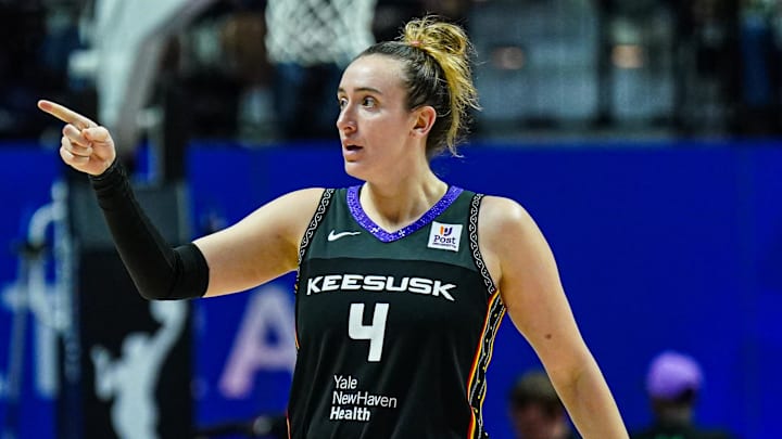 Oct 6, 2024; Uncasville, Connecticut, USA; Connecticut Sun guard Marina Mabrey (4) reacts after her basket against the Minnesota Lynx in the second half during game four of the 2024 WNBA Semi-finals at Mohegan Sun Arena. Mandatory Credit: David Butler II-Imagn Images Oct 6, 2024; Uncasville, Connecticut, USA; Connecticut Sun guard Marina Mabrey (4) reacts after her basket against the Minnesota Lynx in the second half during game four of the 2024 WNBA Semi-finals at Mohegan Sun Arena. Mandatory Credit: David Butler II-Imagn Images