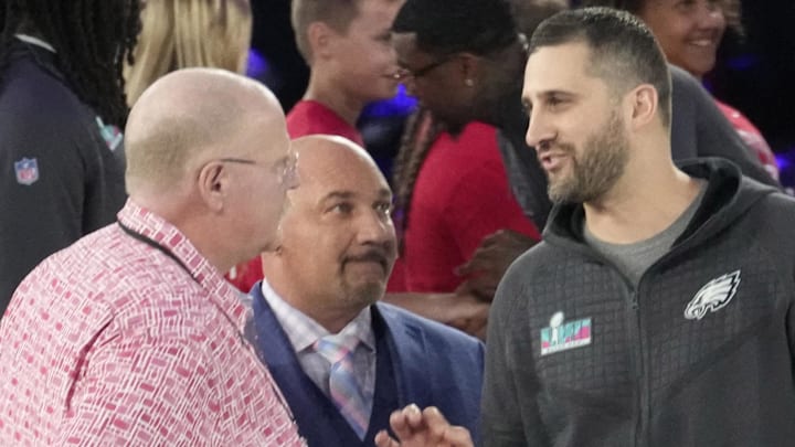 Feb 6, 2023; Phoenix, Ariz., U.S.;  Kansas City Chiefs head coach Andy Reid (left) and Philadelphia Eagles head coach Nick Sirriani chat on stage during Super Bowl Opening Night at Footprint Center. Mandatory Credit: Michael Chow-Arizona Republic