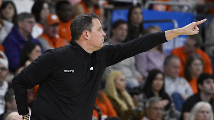 Mar 20, 2025; Providence, RI, USA; McNeese State Cowboys head coach Will Wade signals to his players during the second half against the Clemson Tigers at Amica Mutual Pavilion. Mandatory Credit: Eric Canha-Imagn Images Mar 20, 2025; Providence, RI, USA; McNeese State Cowboys head coach Will Wade signals to his players during the second half against the Clemson Tigers at Amica Mutual Pavilion. Mandatory Credit: Eric Canha-Imagn Images