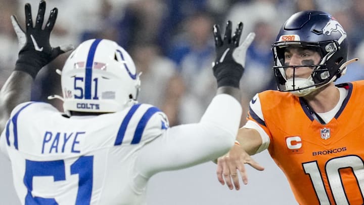 Sep 14, 2025; Indianapolis, Indiana, USA; Indianapolis Colts defensive end Kwity Paye (51) puts pressure on Denver Broncos quarterback Bo Nix (10) at Lucas Oil Stadium. Mandatory Credit: INDIANAPOLIS STAR-USA TODAY Network via Imagn Images