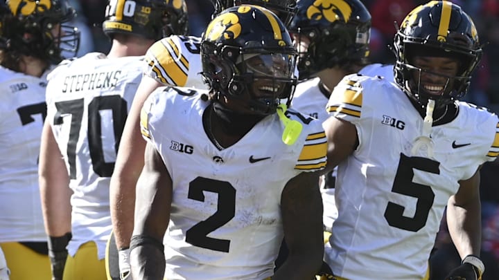 Nov 23, 2024; College Park, Maryland, USA;  Iowa Hawkeyes running back Kaleb Johnson (2) celebrates after scoring a touchdown during the first half against the Maryland Terrapins at SECU Stadium. Mandatory Credit: Tommy Gilligan-Imagn Images