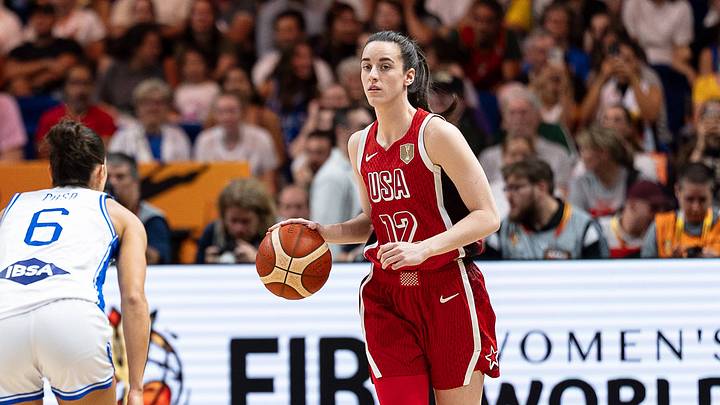 Caitlin Clark dribbling during a FIBA World Cup game. Caitlin Clark dribbling during a FIBA World Cup game.