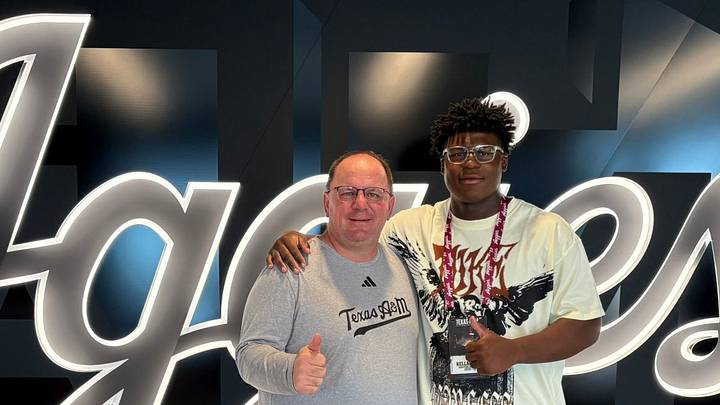 Texas A&M Head Coach Mike Elko with recruiting target Kellan Hall Texas A&M Head Coach Mike Elko with recruiting target Kellan Hall
