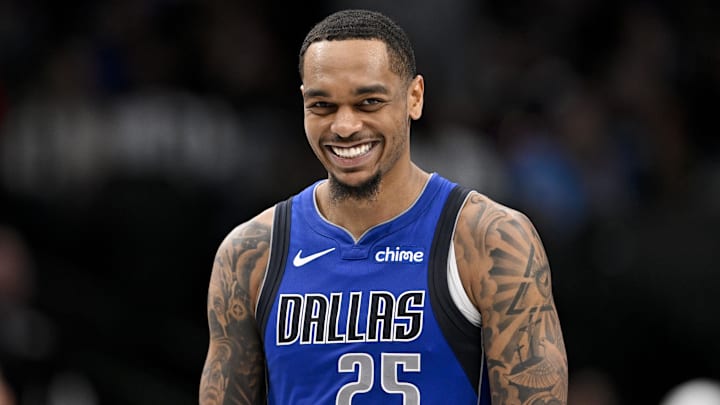 Dallas Mavericks forward P.J. Washington (25) smiles for the fans during the second half of the game against the Detroit Pistons at the American Airlines Center. Mandatory Credit: Jerome Miron-Imagn Images