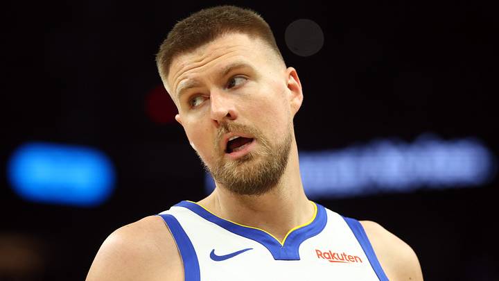 Apr 17, 2026; Phoenix, Arizona, USA; Golden State Warriors center Kristaps Porzingis (7) against the Phoenix Suns during the play-in rounds of the 2026 NBA Playoffs at Mortgage Matchup Center. Mandatory Credit: Mark J. Rebilas-Imagn Images