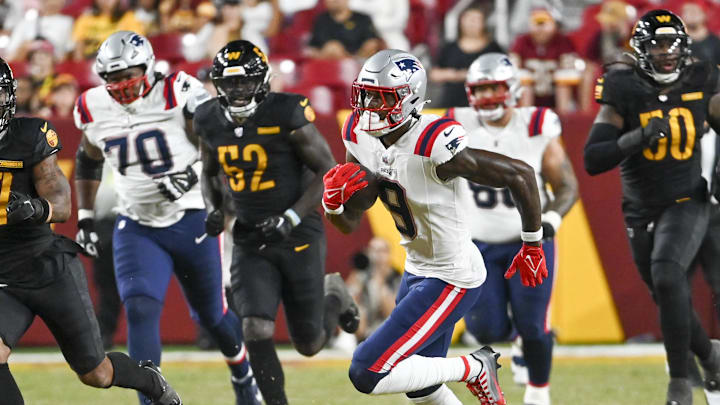 Aug 25, 2024; Landover, Maryland, USA;  New England Patriots  wide receiver Matt Landers (9) runs after the catch during the second  half against the Washington Commanders at Commanders Field. Mandatory Credit: Tommy Gilligan-Imagn Images