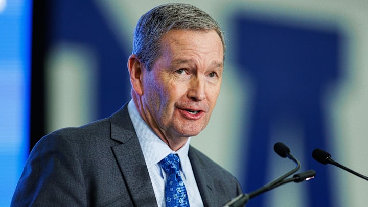 Dec 3, 2025; Lexington, KY, USA; Kentucky Wildcats athletic director Mitch Barnhart speaks during the introductory press conference for head football coach Will Stein at Nutter Field House. Mandatory Credit: Jordan Prather-Imagn Images Dec 3, 2025; Lexington, KY, USA; Kentucky Wildcats athletic director Mitch Barnhart speaks during the introductory press conference for head football coach Will Stein at Nutter Field House. Mandatory Credit: Jordan Prather-Imagn Images