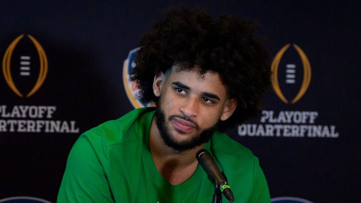 Oregon quarterback Dante Moore speaks during the Oregon Ducks media day ahead of Orange Bowl on Dec. 30, 2025, at Hard Rock Stadium in Miami, Florida. Oregon quarterback Dante Moore speaks during the Oregon Ducks media day ahead of Orange Bowl on Dec. 30, 2025, at Hard Rock Stadium in Miami, Florida.