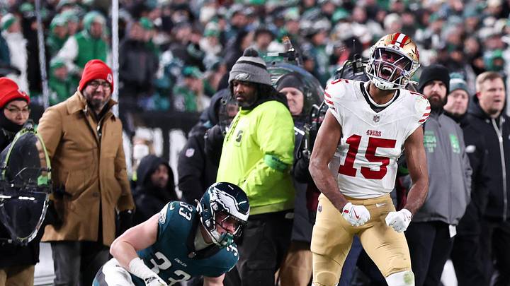 Jan 11, 2026; Philadelphia, PA, USA; San Francisco 49ers wide receiver Jauan Jennings (15) reacts in front of Philadelphia Eagles cornerback Cooper DeJean (33) after a first down catch in an NFC Wild Card Round game at Lincoln Financial Field. Mandatory Credit: Bill Streicher-Imagn Images