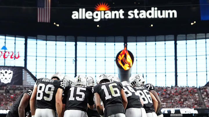 Sep 29, 2024; Paradise, Nevada, USA; The Las Vegas Raiders huddle up before a play against the Cleveland Browns during the third quarter at Allegiant Stadium. Mandatory Credit: Stephen R. Sylvanie-Imagn Images