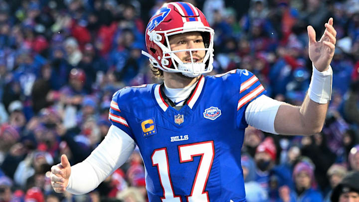 Buffalo Bills quarterback Josh Allen runs onto the field before the game against the New York Jets at Highmark Stadium.