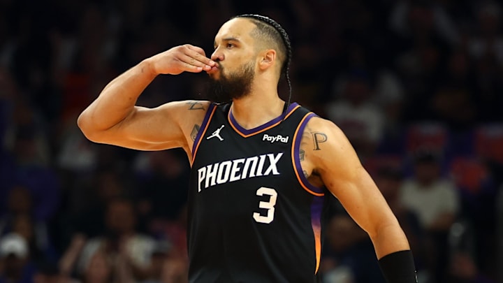 Apr 17, 2026; Phoenix, Arizona, USA; Phoenix Suns forward Dillon Brooks (3) celebrates a three point shot against the Golden State Warriors during the first half in the play-in rounds of the 2026 NBA Playoffs at Mortgage Matchup Center. Mandatory Credit: Mark J. Rebilas-Imagn Images