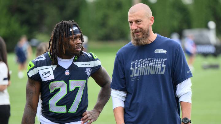 Jul 25, 2026; Renton, WA, USA; Seattle Seahawks running back Emanuel Wilson (27) and offensive coordinator Brian Fleury after the first training camp at Virginia Mason Athletic Center.