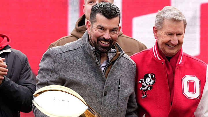 Ohio State Buckeyes head coach Ryan Day holds the College Football Playoff trophy during the Ohio State Buckeyes National Championship celebration at Ohio Stadium in Columbus on Jan. 26, 2025.