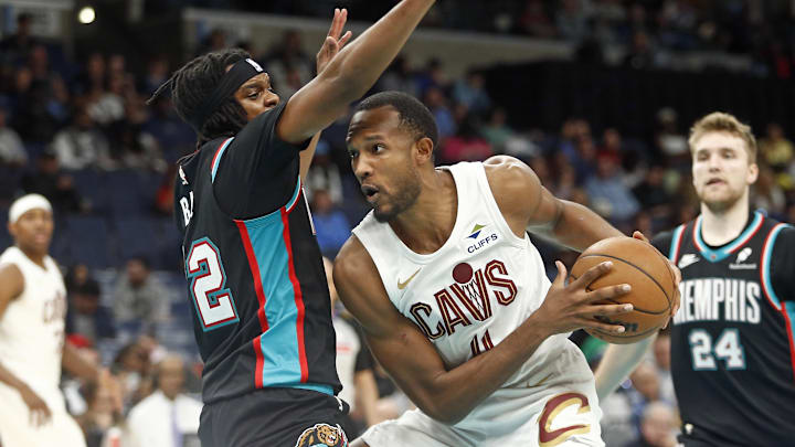 Apr 6, 2026; Memphis, Tennessee, USA; Cleveland Cavaliers center Evan Mobley (4) drives to the basket as Memphis Grizzlies guard Adama Bal (72) defends during the fourth quarter at FedExForum. Mandatory Credit: Petre Thomas-Imagn Images