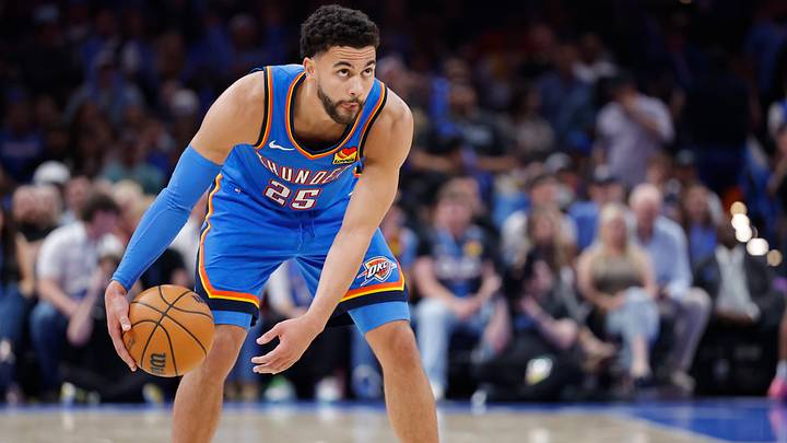 Apr 2, 2026; Oklahoma City, Oklahoma, USA; Oklahoma City Thunder guard Ajay Mitchell (25) dribbles down the court against the Los Angeles Lakers during the second half at Paycom Center. Mandatory Credit: Alonzo Adams-Imagn Images