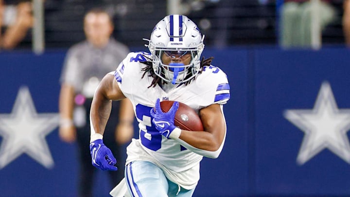 Dallas Cowboys running back Jaydon Blue carries the ball during the fourth quarter against the Atlanta Falcons 