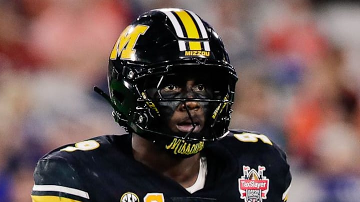 Dec 27, 2025; Jacksonville, FL, USA; Missouri Tigers defensive end Zion Young (9) looks on before a play against the Virginia Cavaliers in the first half at EverBank Stadium. Mandatory Credit: Travis Register-Imagn Images