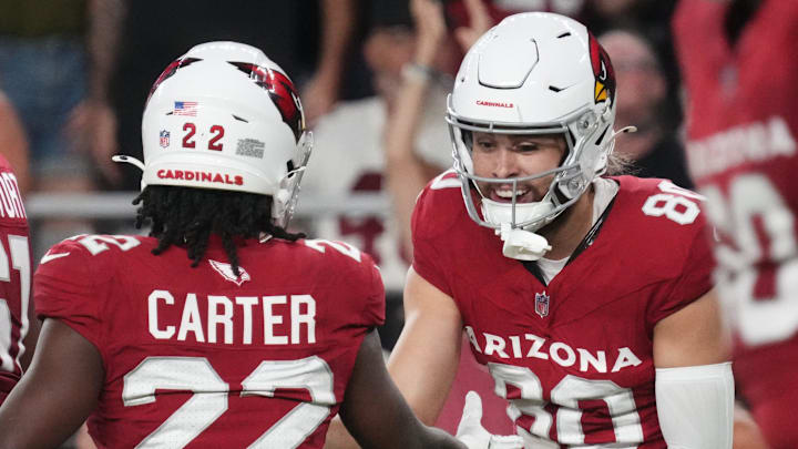 Arizona Cardinals receiver Simi Fehoko (80) celebrates his touchdown catch with teammate Michael Carter (22) as they play against the Las Vegas Raiders at State Farm Stadium in Glendale, on Aug. 23, 2025. Arizona Cardinals receiver Simi Fehoko (80) celebrates his touchdown catch with teammate Michael Carter (22) as they play against the Las Vegas Raiders at State Farm Stadium in Glendale, on Aug. 23, 2025.