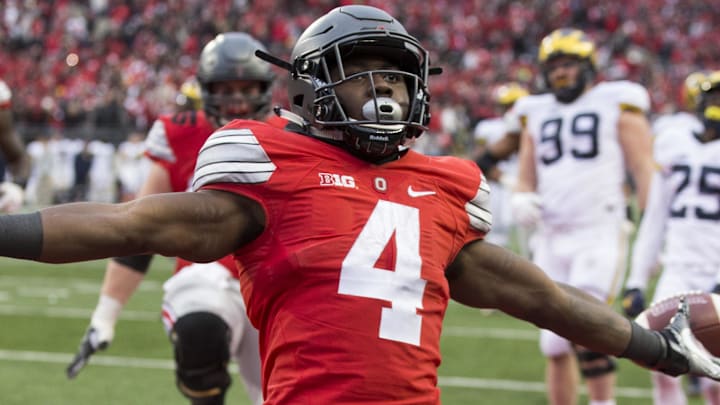 Nov 26, 2016; Columbus, OH, USA; Ohio State Buckeyes running back Curtis Samuel (4) celebrates after scoring the game winning touchdown against the Michigan Wolverines in the second overtime at Ohio Stadium. Ohio State won the game 30-27 in double overtime.Mandatory Credit: Greg Bartram-Imagn Images Nov 26, 2016; Columbus, OH, USA; Ohio State Buckeyes running back Curtis Samuel (4) celebrates after scoring the game winning touchdown against the Michigan Wolverines in the second overtime at Ohio Stadium. Ohio State won the game 30-27 in double overtime.Mandatory Credit: Greg Bartram-Imagn Images