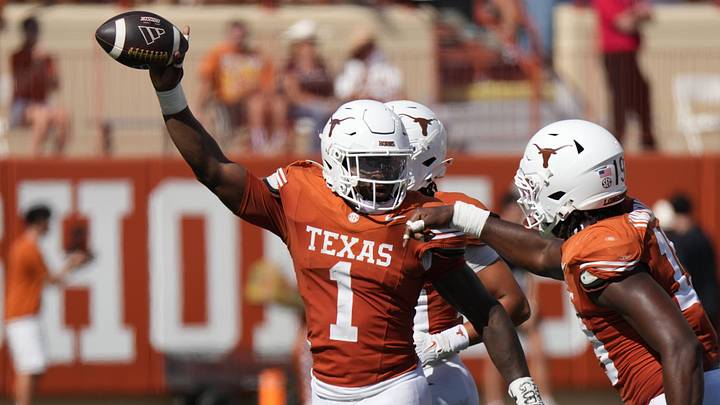 Texas Longhorns edge Colin Simmons reacts after recovering a fumble during the third quarter against the Texas State Bobcats Texas Longhorns edge Colin Simmons reacts after recovering a fumble during the third quarter against the Texas State Bobcats