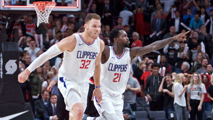 Oct 26, 2017; Portland, OR, USA; LA Clippers forward Blake Griffin (32) and guard Patrick Beverley (21) celebrate after Griffin hit he game winning basket against the Portland Trail Blazers during the fourth quarter at the Moda Center. Mandatory Credit: Craig Mitchelldyer-Imagn Images