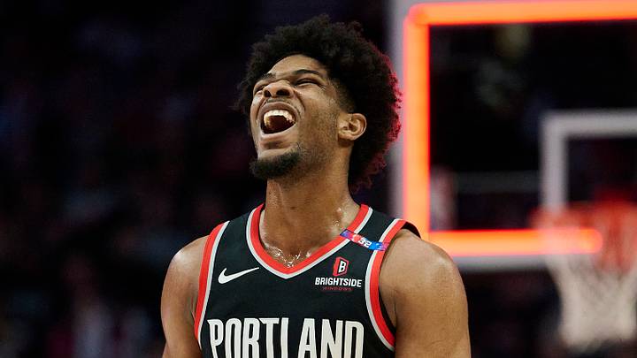 Feb 22, 2025; Portland, Oregon, USA; Portland Trail Blazers guard Scoot Henderson (00) reacts after missing a three point basket during the second half against the Charlotte Hornets at Moda Center. Mandatory Credit: Troy Wayrynen-Imagn Images
