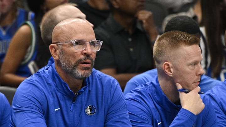 Oct 24, 2024; Dallas, Texas, USA; in Dallas Mavericks head coach Jason Kidd (left) and assistant coach Sean Sweeney (right) during the game between the Dallas Mavericks and the San Antonio Spurs at the American Airlines Center. Mandatory Credit: Jerome Miron-Imagn Images