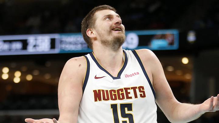 Mar 18, 2026; Memphis, Tennessee, USA; Denver Nuggets center Nikola Jokic (15) reacts during the second quarter against the Memphis Grizzlies at FedExForum. Mandatory Credit: Petre Thomas-Imagn Images Mar 18, 2026; Memphis, Tennessee, USA; Denver Nuggets center Nikola Jokic (15) reacts during the second quarter against the Memphis Grizzlies at FedExForum. Mandatory Credit: Petre Thomas-Imagn Images