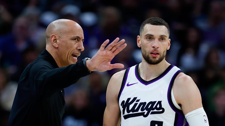 Mar 27, 2025; Sacramento, California, USA; Sacramento Kings interim head coach Doug Christie talks to guard Zach LaVine (8) during the fourth quarter against the Portland Trail Blazers at Golden 1 Center. Mandatory Credit: Sergio Estrada-Imagn Images
