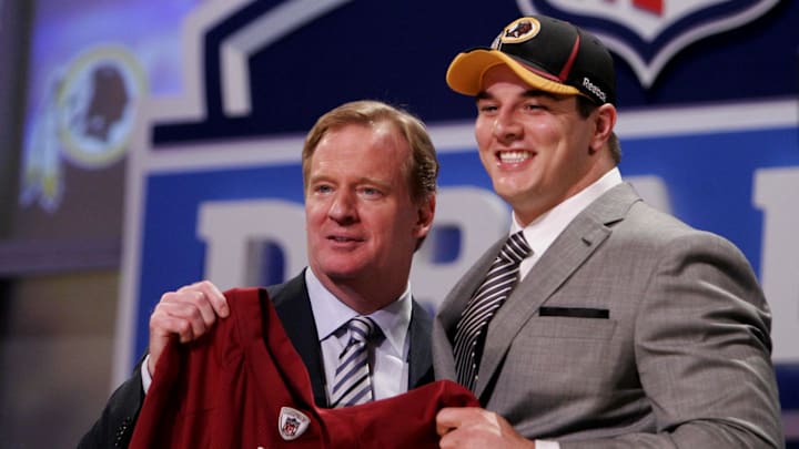 NFL commissioner Roger Goodell introduces defensive end Ryan Kerrigan (Purdue) as the number sixteen overall pick.