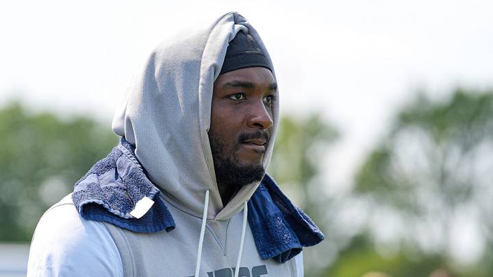 Detroit Lions defensive end Derrick Moore (9) walks off the field after 2026 training camp practice Detroit Lions defensive end Derrick Moore (9) walks off the field after 2026 training camp practice