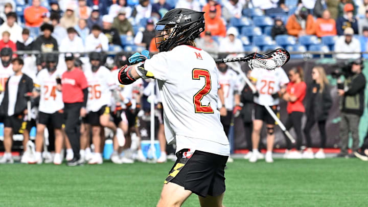 May 24, 2025; Foxborough, MA, USA; Maryland midfielder Aidan Aitken passes the ball during the NCAA Men's Lacrosse National Championship Semifinals at Gillette Stadium. May 24, 2025; Foxborough, MA, USA; Maryland midfielder Aidan Aitken passes the ball during the NCAA Men's Lacrosse National Championship Semifinals at Gillette Stadium.