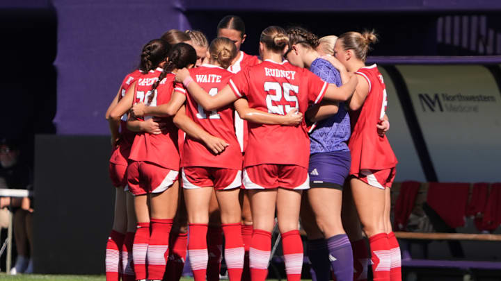 Nebraska players huddle at Northwestern.